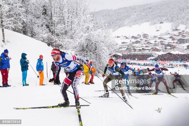 9th place Simon Eder of Austria and 8th place Benedikt Doll of Germany compete during the IBU Biathlon World Cup Men's Pursuit on December 16, 2017...