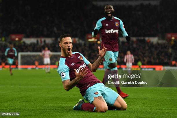 Marko Arnautovic of West Ham United celebrates after scoring his sides second goal during the Premier League match between Stoke City and West Ham...