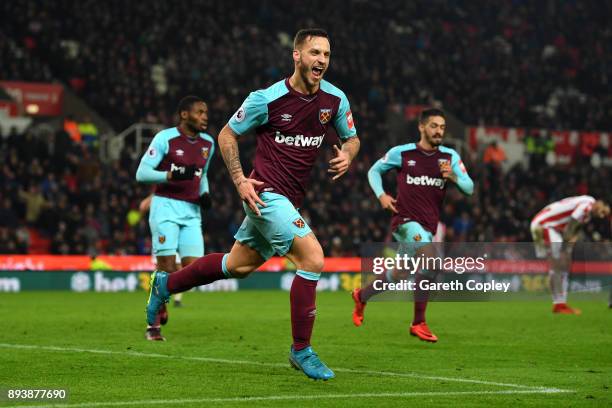 Marko Arnautovic of West Ham United celebrates after scoring his sides second goal during the Premier League match between Stoke City and West Ham...