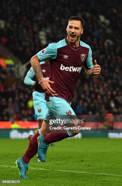 Marko Arnautovic of West Ham United celebrates after scoring his sides second goal during the Premier League match between Stoke City and West Ham...