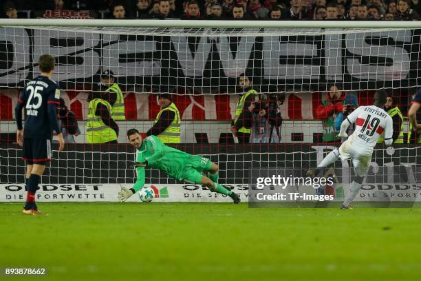 Goalkeeper Sven Ulreich of Muenchen and Chadrac Akolo of Stuttgart in action during the Bundesliga match between VfB Stuttgart and FC Bayern Muenchen...