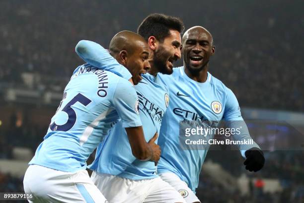Ilkay Gundogan of Manchester City celebrates after scoring his sides first goal with his Manchester City team mates during the Premier League match...