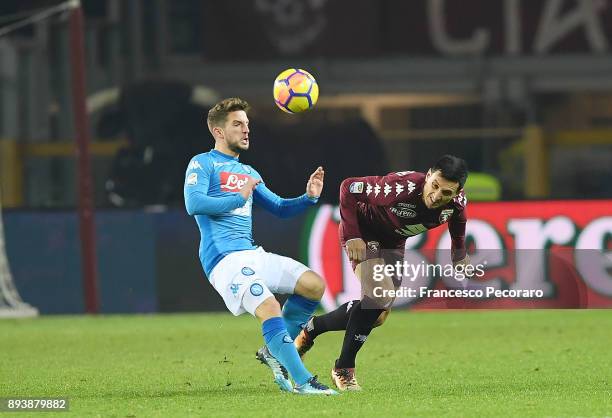 Player of SSC Napoli Dries Mertens vies with Torino FC player Nicolas Burdisso during the Serie A match between Torino FC and SSC Napoli at Stadio...