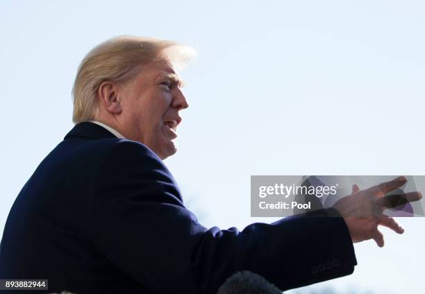 President Donald J. Trump makes a statement to the media as he departs the White House December 16, 2017 in Washington, DC. Trump is heading for an...