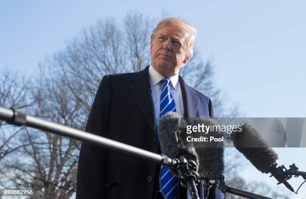 President Donald J. Trump makes a statement to the media as he departs the White House December 16, 2017 in Washington, DC. Trump is heading for an...