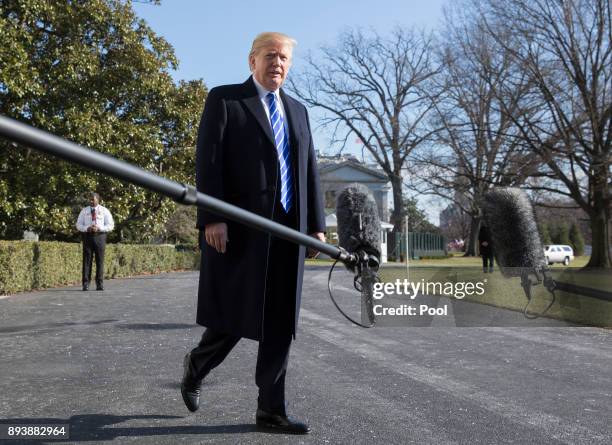 President Donald J. Trump makes a statement to the media as he departs the White House December 16, 2017 in Washington, DC. Trump is heading for an...