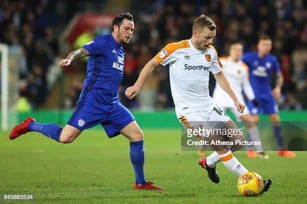 Lee Tomlin of Cardiff City marks Seb Larsson of Hull City during the Sky Bet Championship match between Cardiff City and Hull City at the Cardiff...