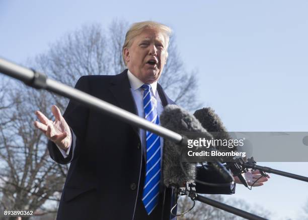 President Donald Trump speaks to members of the media before departing for Camp David on the South Lawn of the White House in Washington, D.C., U.S.,...