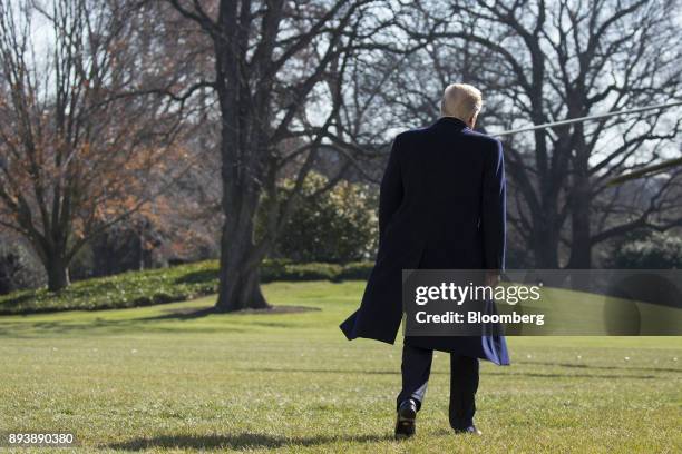 President Donald Trump departs for Camp David on the South Lawn of the White House in Washington, D.C., U.S., on Saturday, Dec. 16, 2017. Trump had...