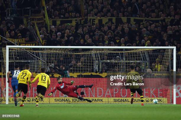 Pierre-Emerick Aubameyang of Dortmund scores a goal from the penally spot to make it 1:1 past goalkeeper Oliver Baumann of Hoffenheim during the...