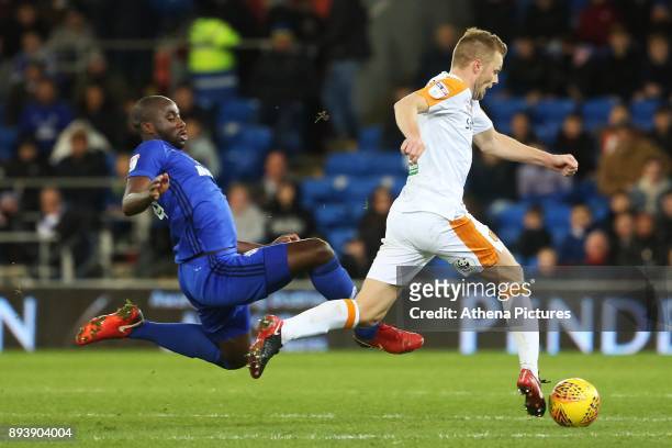 Sol Bamba of Cardiff City challenges Seb Larsson of Hull City during the Sky Bet Championship match between Cardiff City and Hull City at the Cardiff...