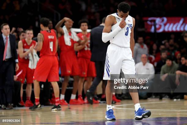 Jeremiah Martin of the Memphis Tigers reacts late in the second half against the Louisville Cardinals during their Gotham Classic game at Madison...