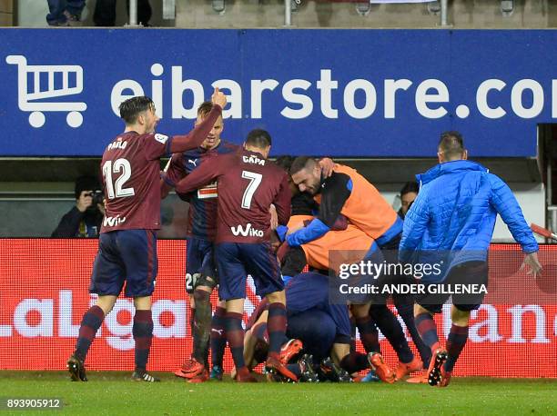 Eibar players celebrate their second goal during the Spanish league football match SD Eibar vs Valencia CF at the Ipurua stadium in Eibar on December...