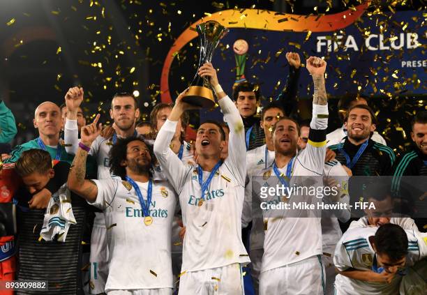 Cristiano Ronaldo of Real Madrid lifts the trophy after the FIFA Club World Cup UAE 2017 Final between Gremio and Real Madrid at the Zayed Sports...
