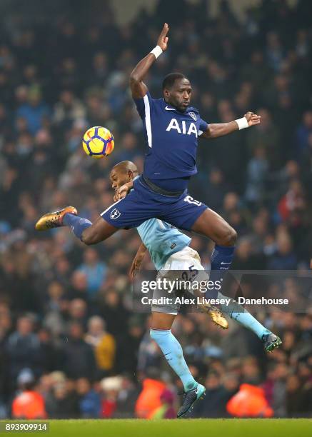 Moussa Sissoko of Tottenham Hotspur and Fernandinho of Manchester City challenge for the ball during the Premier League match between Manchester City...