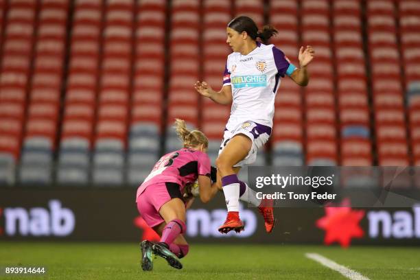 Samantha Kerr of Perth Glory clashes with Britt Eckerstrom of the Jets during the round eight W-League match between the Newcastle Jets and the Perth...