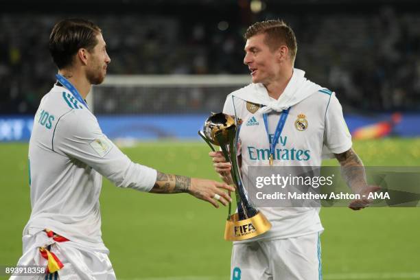 Sergio Ramos of Real Madrid celebrates with Toni Kroos at the end of the FIFA Club World Cup UAE 2017 final match between Gremio and Real Madrid CF...