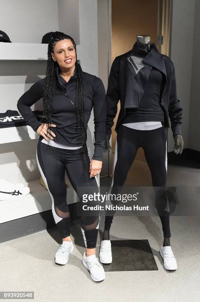 Boxer Alicia "The Empress" Napoleon holds a workout class at the new ASICS Flagship store on December 16, 2017 in New York City.