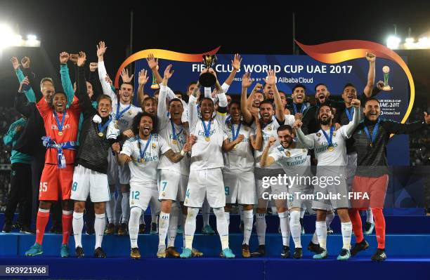 Sergio Ramos of Real Madrid lifts the trophy after the FIFA Club World Cup UAE 2017 final match between Gremio and Real Madrid at Zayed Sports City...