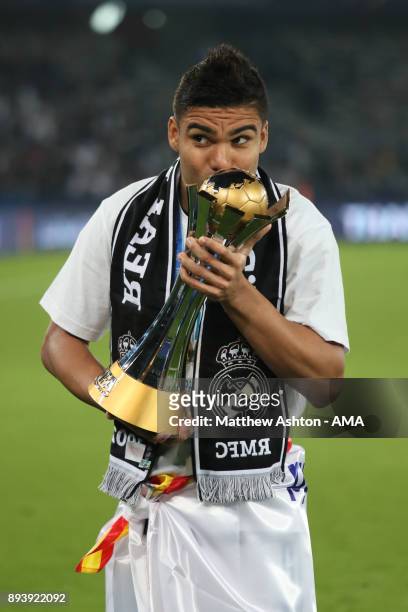 Casemiro of Real Madrid kisses the trophy at the end of the FIFA Club World Cup UAE 2017 final match between Gremio and Real Madrid CF at Zayed...