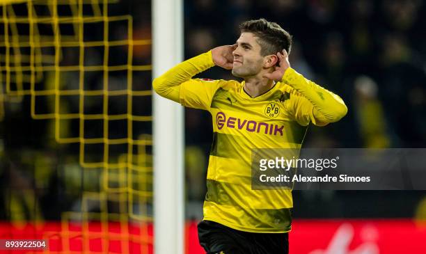 Christian Pulisic of Borussia Dortmund celebrates scoring the winning goal to the 2:1 during the Bundesliga match between Borussia Dortmund and SG...