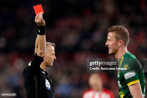 Thomas Meissner of ADO Den Haag receives a red card from Referee Bjorn Kuipers during the Dutch Eredivisie match between PSV v ADO Den Haag at the...