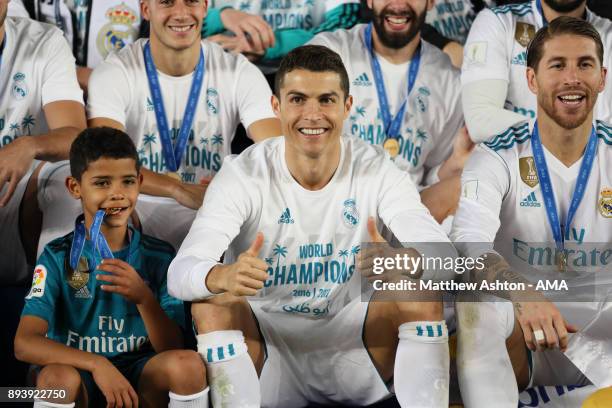 Cristiano Ronaldo of Real Madrid celebrates with his son Cristiano Ronaldo Jnr and his team-mates at the end of the FIFA Club World Cup UAE 2017...