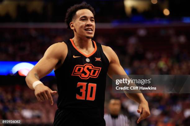 Jeffrey Carroll of the Oklahoma State Cowboys celebrates their 71 to 70 win over the Florida State Seminoles during the MetroPCS Orange Bowl...