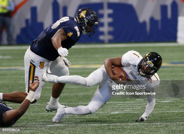 Devante Kincade trips up at mid field during the bowl game between the North Carolina A&T Aggies and the Grambling State Tigers on December 16, 2017...