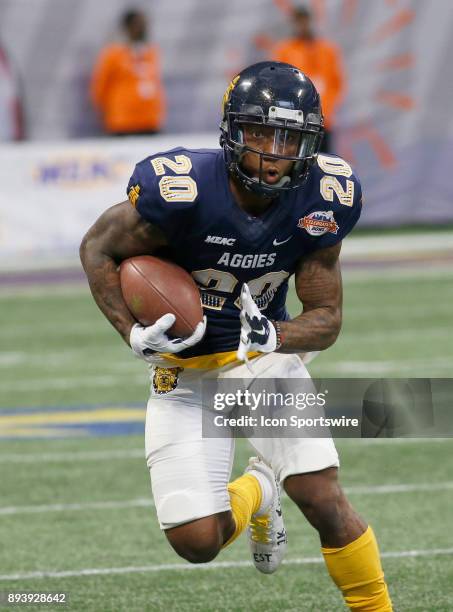 Jamari Smith carries the ball during the bowl game between the North Carolina A&T Aggies and the Grambling State Tigers on December 16, 2017 at...