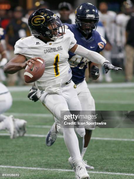 Devante Kincade scrambles during the bowl game between the North Carolina A&T Aggies and the Grambling State Tigers on December 16, 2017 at Mercedes-...