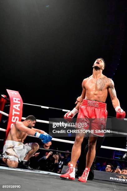 France's Tony Yoka celebrates after winning his Heavy weight boxing bout against Belgium's Ali Baghouz, on December 16, 2017 in Boulogne-Billancourt....