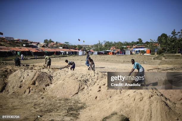 Rohingya people, who fled from oppression within ongoing military operations in Myanmars Rakhine state, are seen at a refugee camp in Cox's Bazar,...