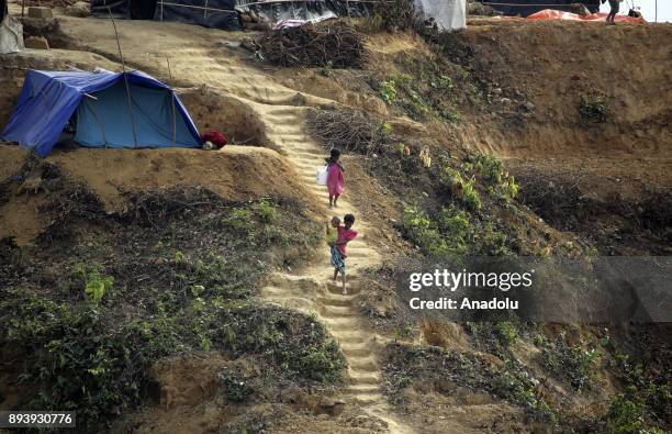 Rohingya kids, who fled from oppression within ongoing military operations in Myanmars Rakhine state, are seen at a refugee camp in Cox's Bazar,...