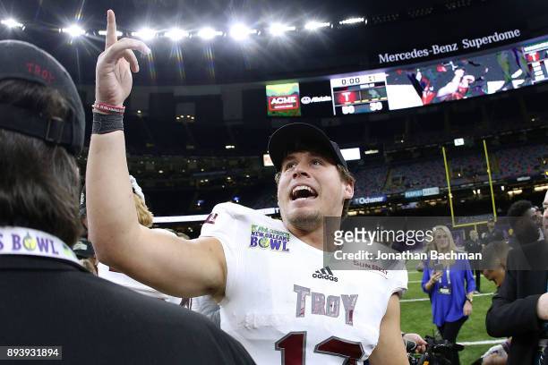 Brandon Silvers of the Troy Trojans celebrates after winning the R+L Carriers New Orleans Bowl against the North Texas Mean Green at the...