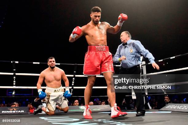 France's Tony Yoka celebrates after winning his Heavy weight boxing bout against Belgium's Ali Baghouz , on December 16, 2017 in...