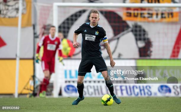 Dennis Grote of Chemnitz plays the ball during the 3. Liga match between FSV Zwickau and Chemnitzer FC at Stadion Zwickau on December 16, 2017 in...