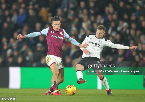 Derby County's Andreas Weimann battles with Aston Villa's Jack Grealish during the Sky Bet Championship match between Derby County and Aston Villa at...