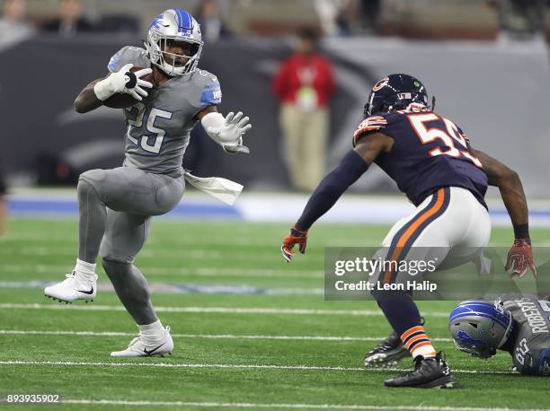 Theo Riddick of the Detroit Lions runs the ball against Danny Trevathan of the Chicago Bears during the first half at Ford Field on December 16, 2017...