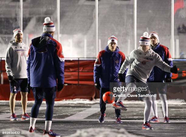 Charles Hudon of the Montreal Canadiens plays soccer with teammates in advance of the 2017 Scotiabank NHL100 Classic at Lansdowne Park on December...