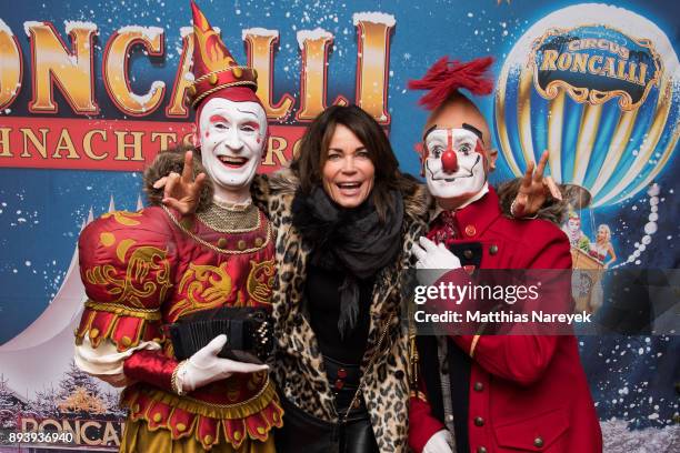Gerit Kling and two clowns attend the 14th Roncalli Christmas at Tempodrom on December 16, 2017 in Berlin, Germany.