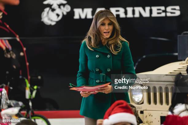 First Lady Melania Trump visits with military kids at the Marine Corps' annual Toys for Tots event, at Joint Base Anacostia-Bolling in Washington,...