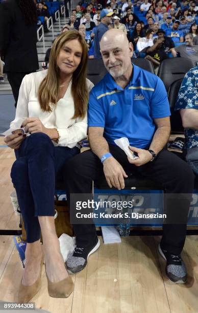 Caitlyn Jenner and publicist Alan Nierob attend the UCLA Bruins and Cincinnati Bearcats college basketball game at Pauley Pavilion on December 16,...