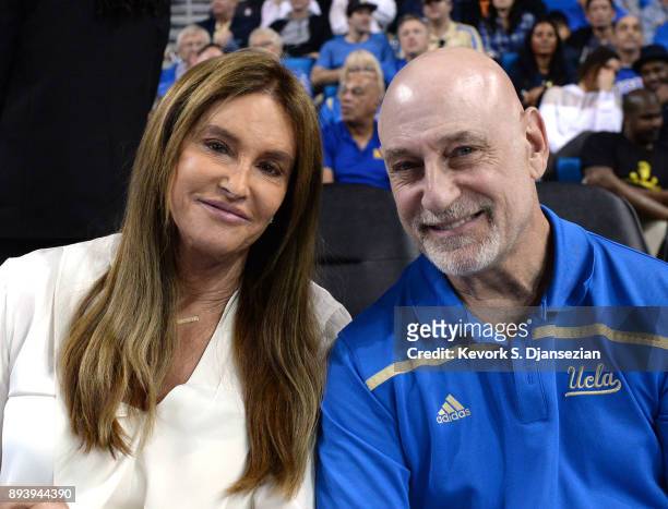 Caitlyn Jenner and publicist Alan Nierob attend the UCLA Bruins and Cincinnati Bearcats college basketball game at Pauley Pavilion on December 16,...