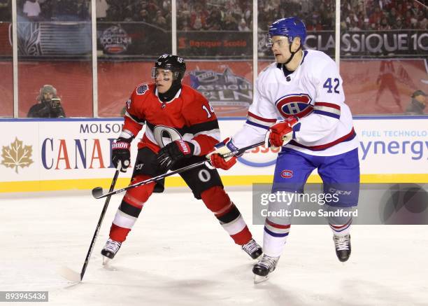 Alexandre Burrows of the Ottawa Senators battles for position with Byron Froese of the Montreal Canadiens during the 2017 Scotiabank NHL100 Classic...