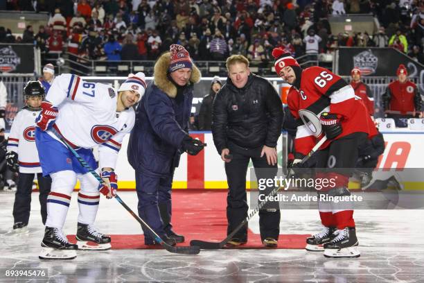 Guy Lafleur and Daniel Alfredsson participate in the ceremonial puck drop, along with Max Pacioretty and Erik Karlsson, prior to the 2017 Scotiabank...