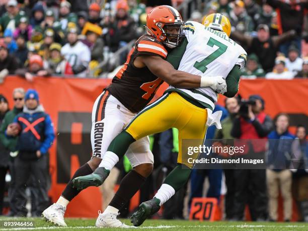 Defensive lineman Nate Orchard of the Cleveland Browns sacks quarterback Brett Hundley of the Green Bay Packers in the first quarter of a game on...