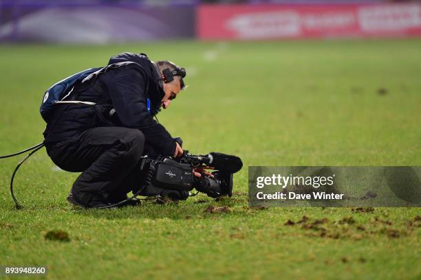 Tv cameraman films the turf during the European Rugby Challenge Cup match between Lyon OU and Stade Toulousain at Stade Gerland on December 16, 2017...