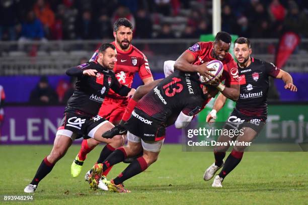 Wandie Mjekevu of Toulouse is tackled by Thibaut Regard of Lyon during the European Rugby Challenge Cup match between Lyon OU and Stade Toulousain at...