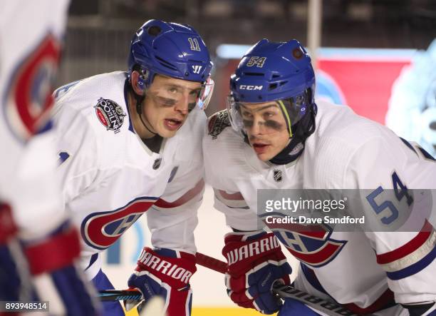 Brendan Gallagher of the Montreal Canadiens talks with teammate Charles Hudon between whistles during the 2017 Scotiabank NHL100 Classic at Lansdowne...